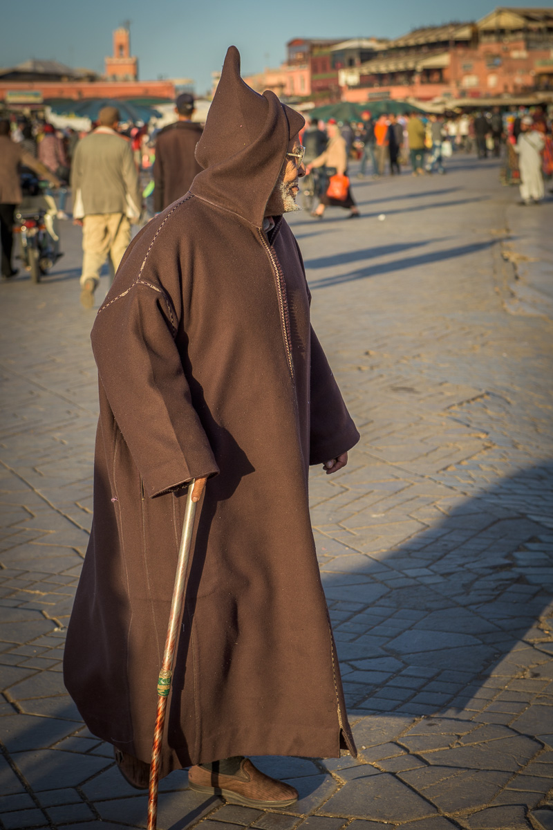 Jemaa el-Fna Square: local Berber man wearing a jilaba, the traditional male outer garment worn in this area