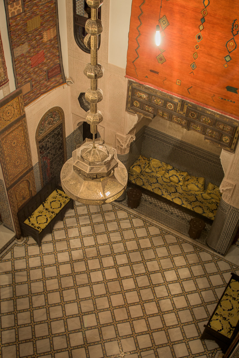 The interior of a souk in the medina where handmade Persian and Berber rugs are elaborately displayed and sold